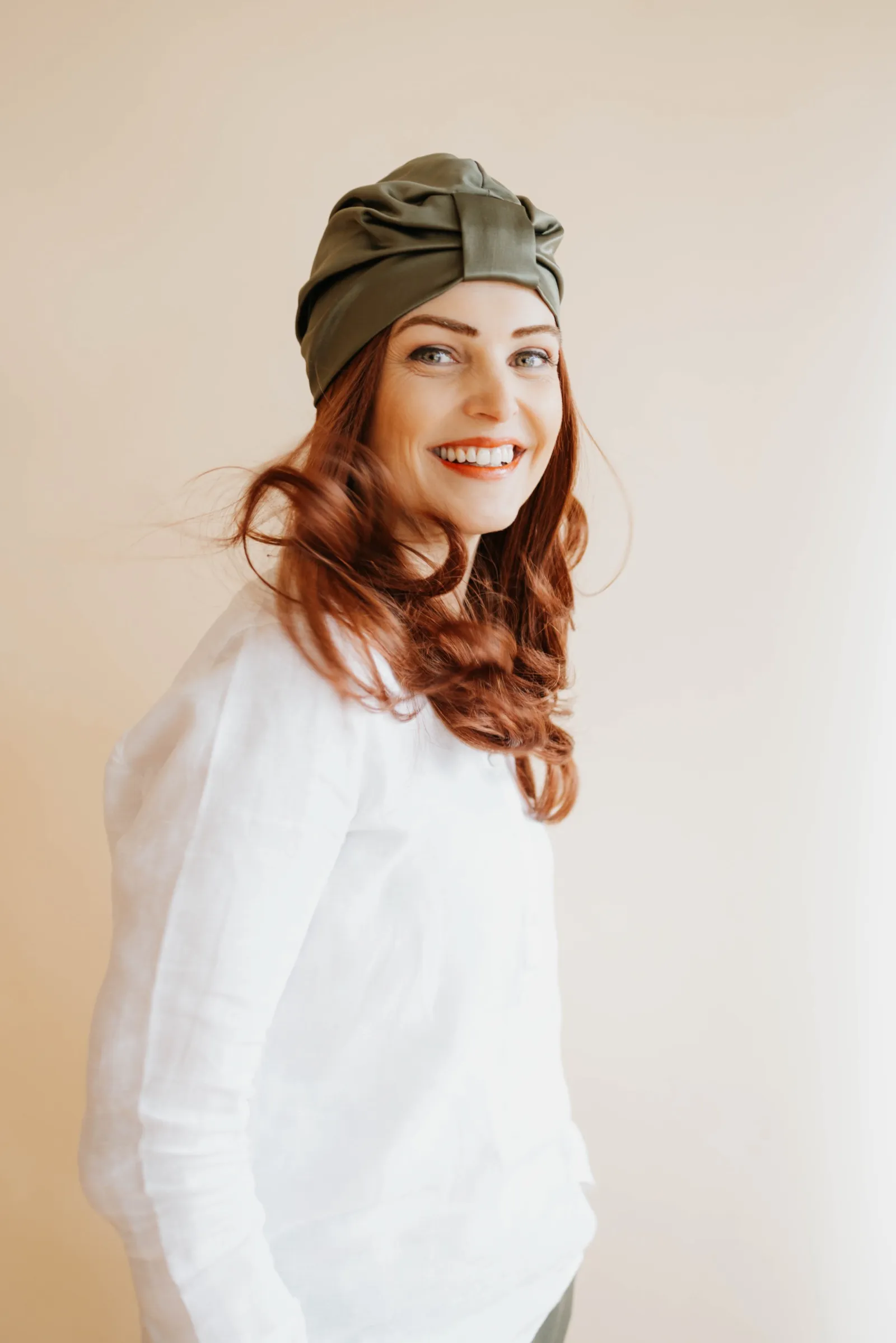 Grüner Turban als Kopfbedeckung